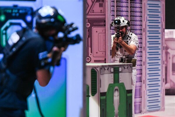 athletes competing in the physical side of phygital shooter